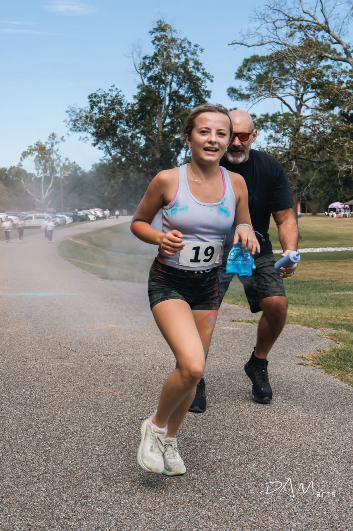 Runners covered in color at a Columbia fun run